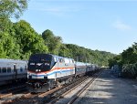 Amtrak Train # 239 zips past the station with Unit # 706 leading